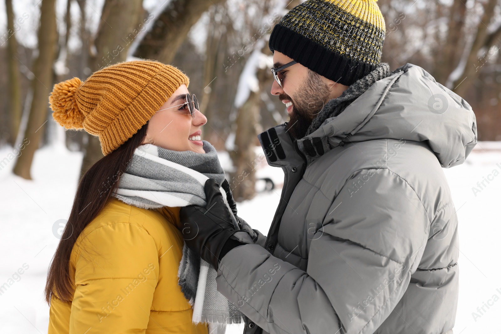 Photo of Beautiful happy couple spending time together on winter day