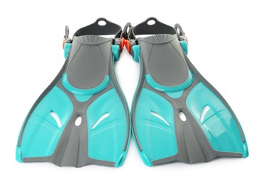 Photo of Pair of turquoise flippers on white background