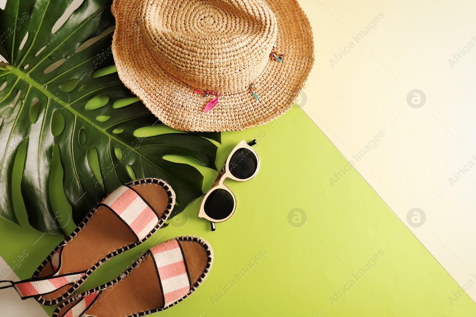 Photo of Flat lay composition with bamboo hat and space for text on color background