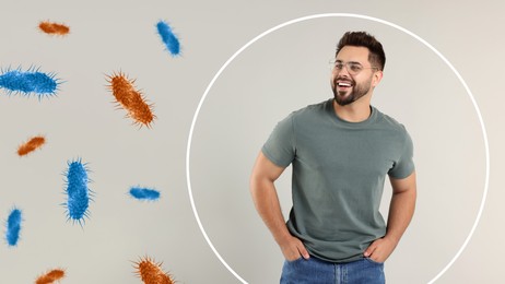 Image of Man with strong immunity surrounded by viruses on grey background, banner design