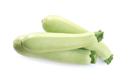 Fresh ripe green zucchinis isolated on white