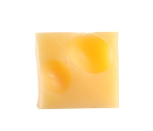 Photo of Cube of delicious cheese isolated on white