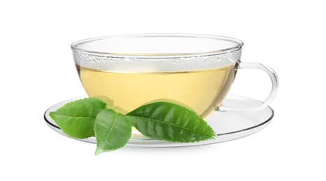 Green tea in glass cup and green leaves isolated on white