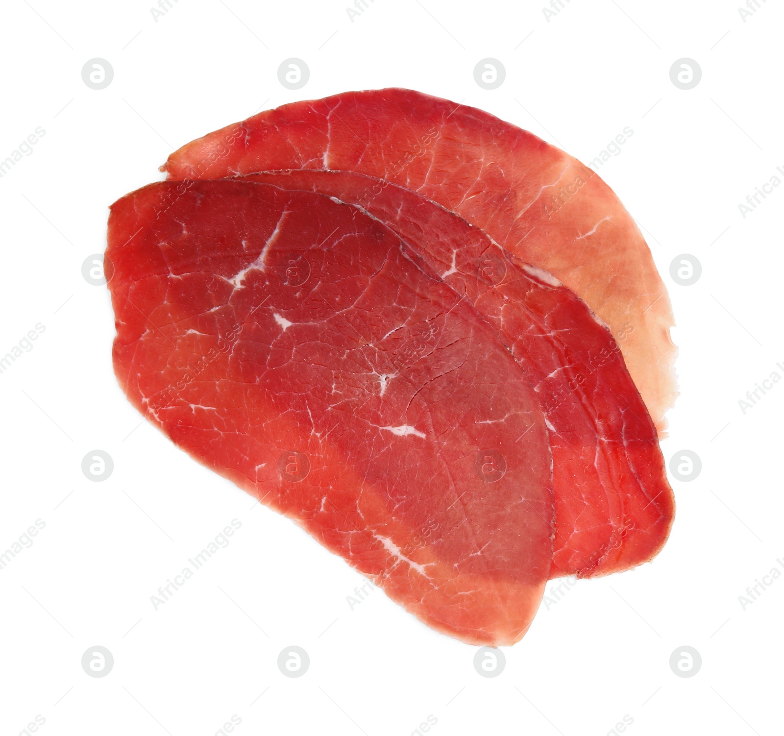 Photo of Slices of tasty bresaola isolated on white, top view