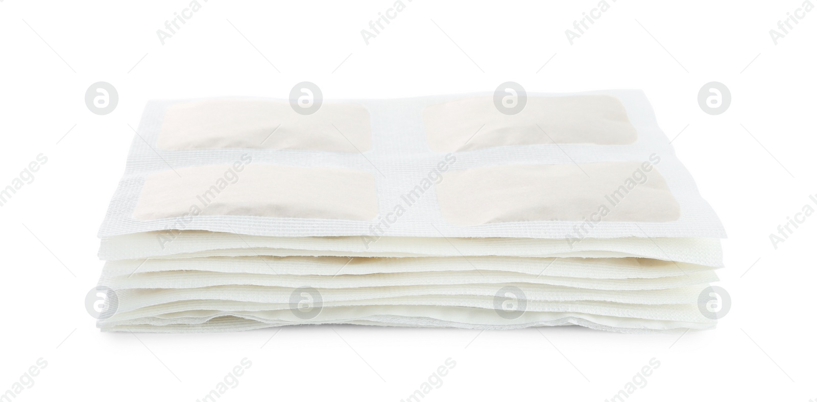 Photo of Stack of mustard plasters on white background