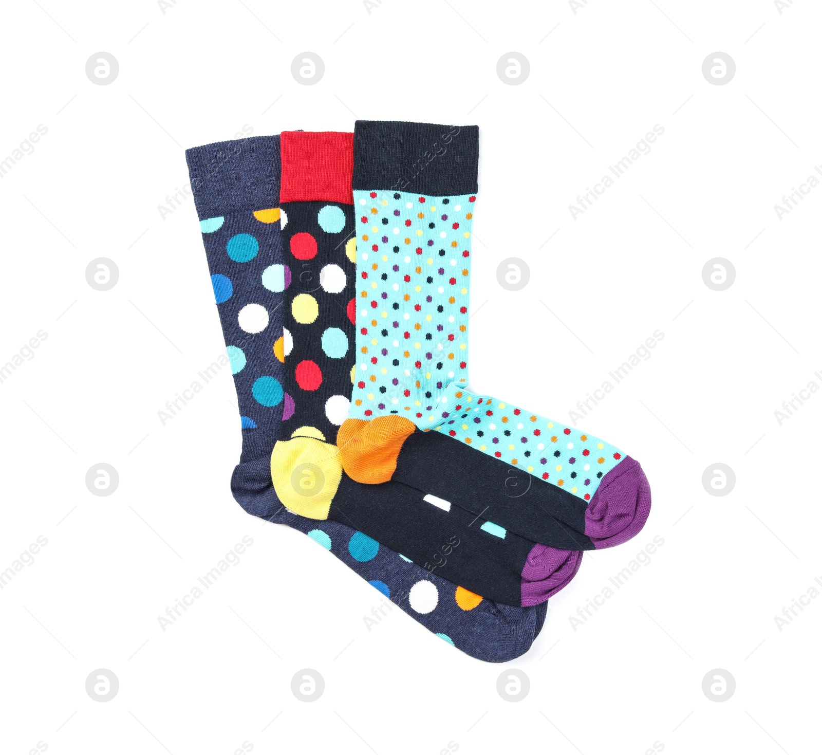 Photo of Colorful socks on white background, top view
