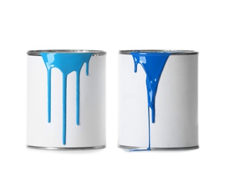 Photo of Open paint cans with stains isolated on white