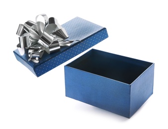 Photo of Open empty gift box with bow on white background