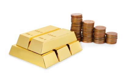 Photo of Shiny gold bars and coins on white background