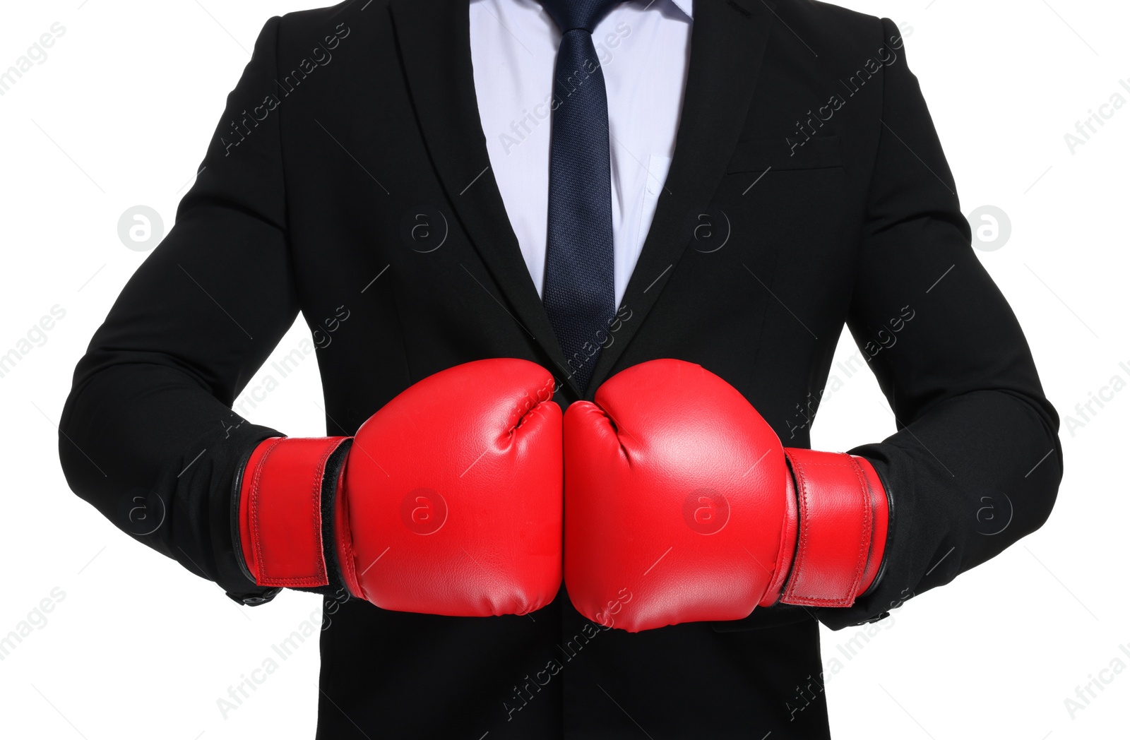 Photo of Businessman in suit wearing boxing gloves on white background, closeup