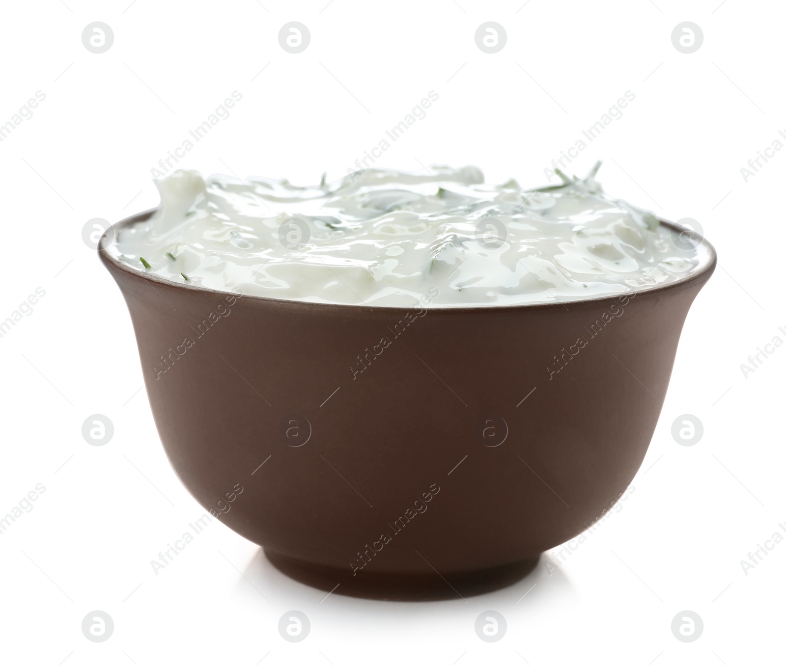 Photo of Bowl with cucumber sauce on white background