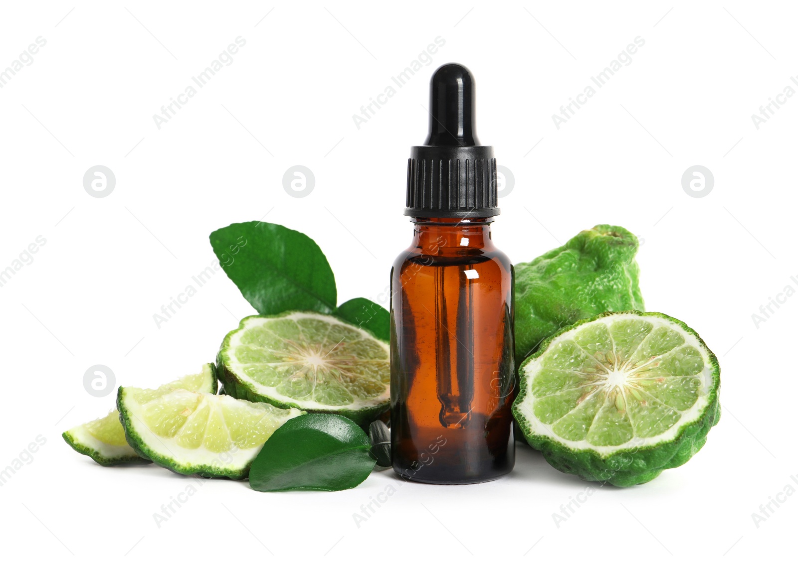 Photo of Bottle of essential oil, fresh bergamot fruits and leaves on white background