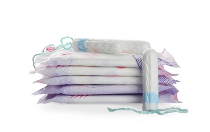 Photo of Menstrual pads and tampons on white background. Gynecological care