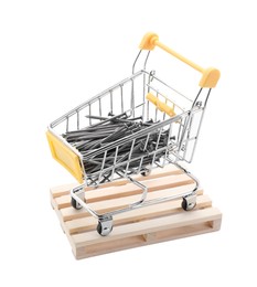 Photo of Small shopping cart with metal nails isolated on white. Construction tools