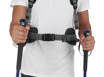 Photo of Man with backpack and trekking poles on white background, closeup
