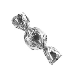 Tasty candy in silver wrapper isolated on white