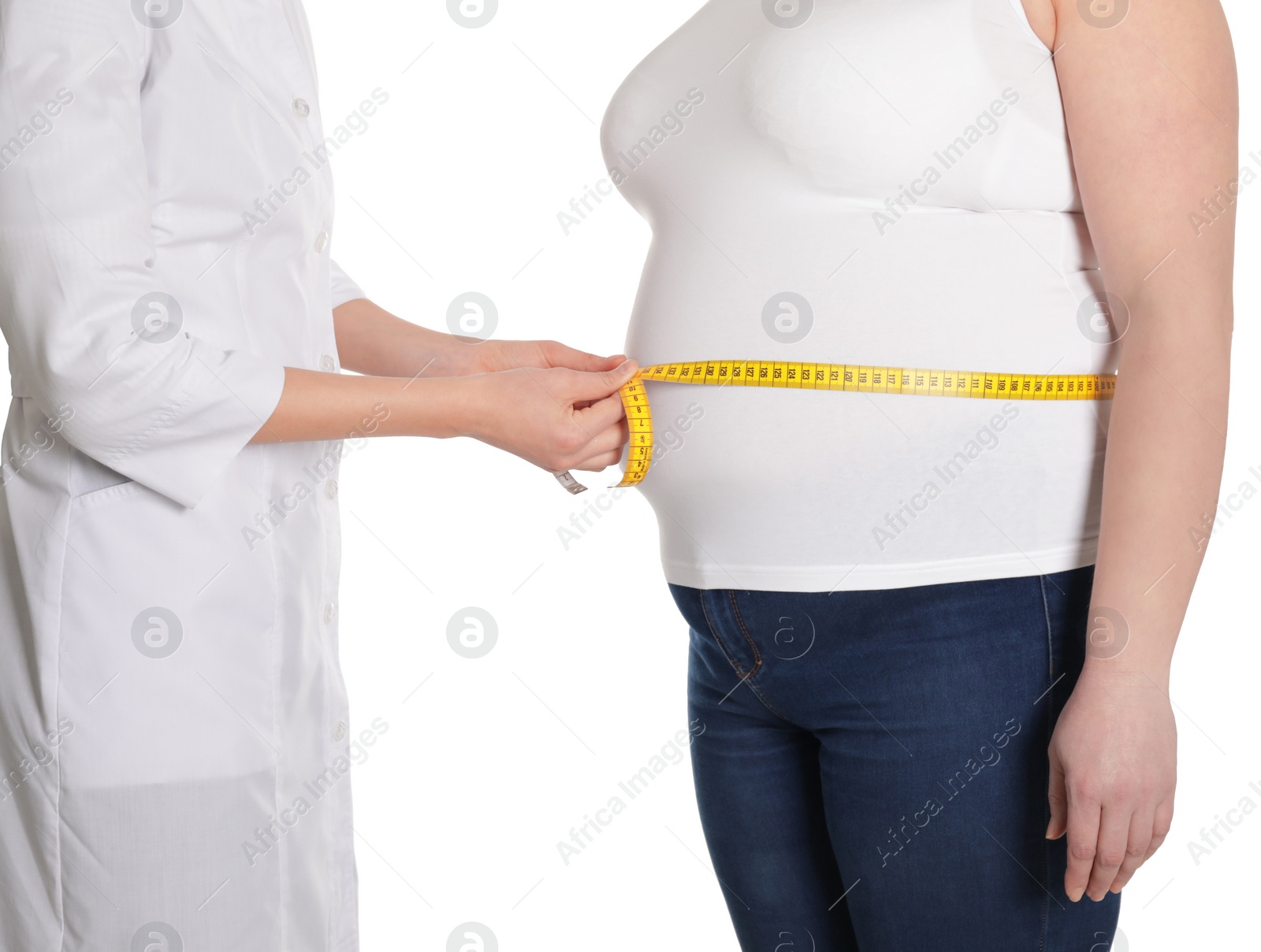Photo of Doctor measuring waist of overweight woman isolated on white, closeup