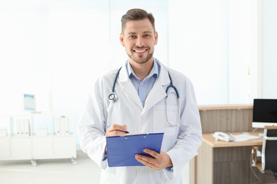 Photo of Male medical assistant in clinic. Health care service