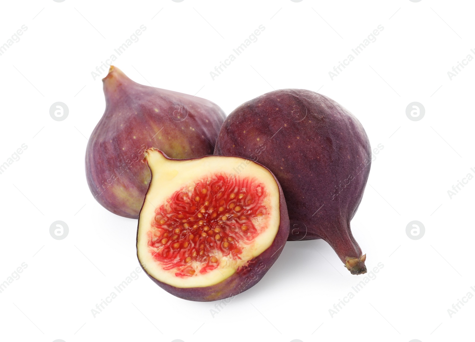 Photo of Whole and cut tasty fresh figs isolated on white