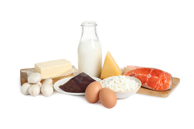 Fresh products rich in vitamin D on white background