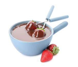 Photo of Fondue pot with chocolate and fresh strawberries isolated on white