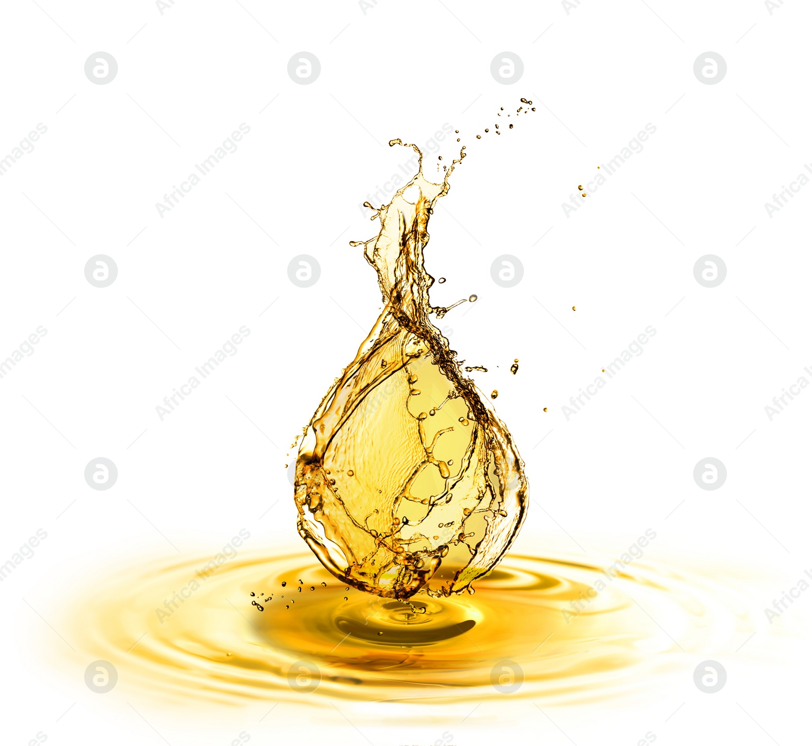 Image of Drop of cooking oil falling into oil on white background