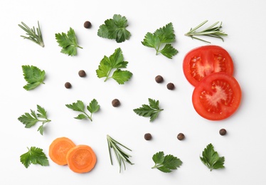 Photo of Flat lay composition with green parsley, rosemary, pepper and vegetables on white background