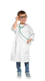 Photo of Cute little child in doctor coat with stethoscope on white background