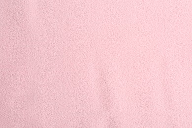 Texture of beautiful pink fabric as background, closeup