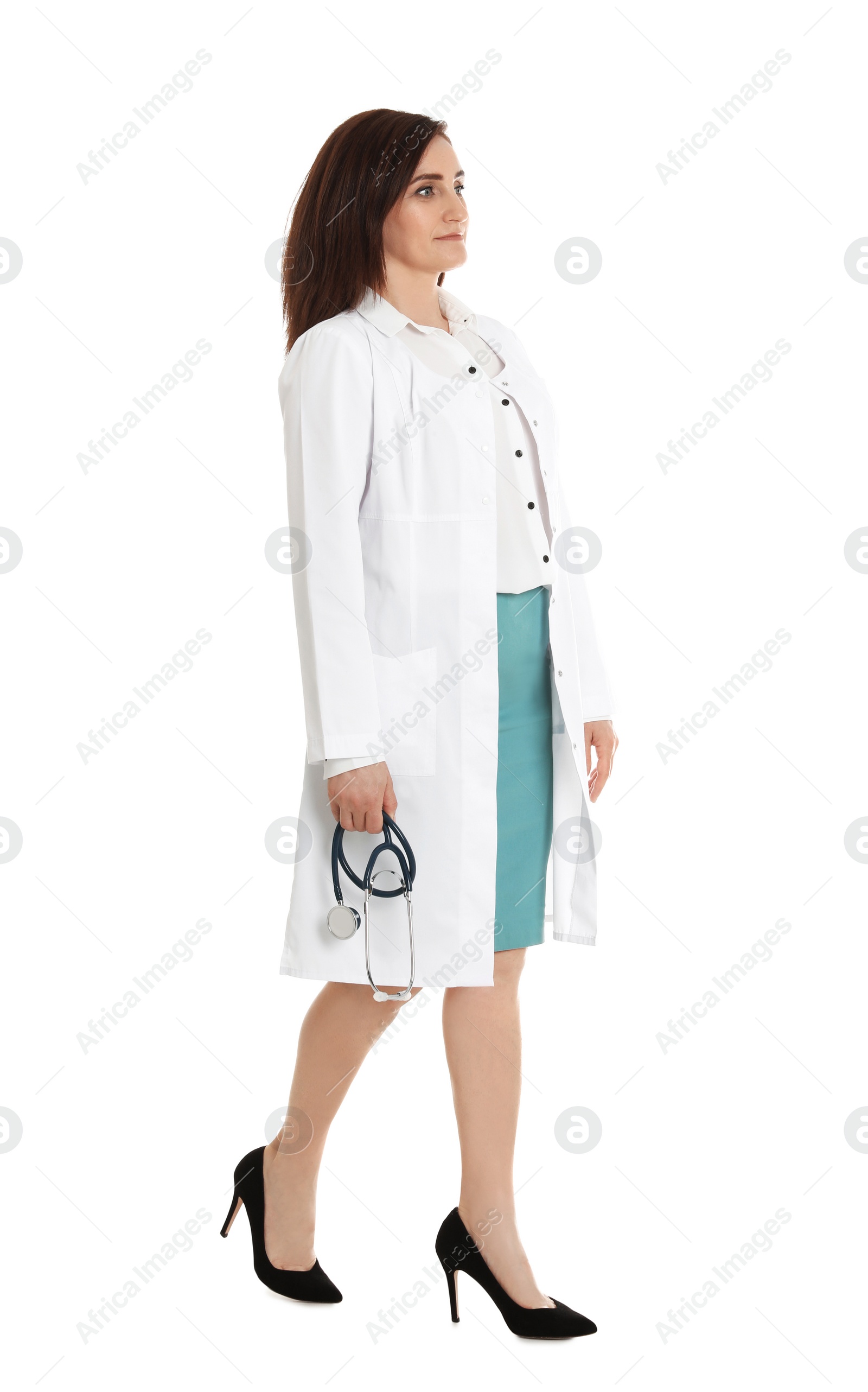 Photo of Full length portrait of female doctor isolated on white. Medical staff