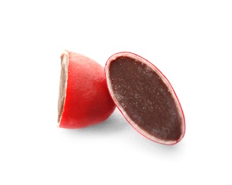 Photo of Chocolate candy cut in half on white background