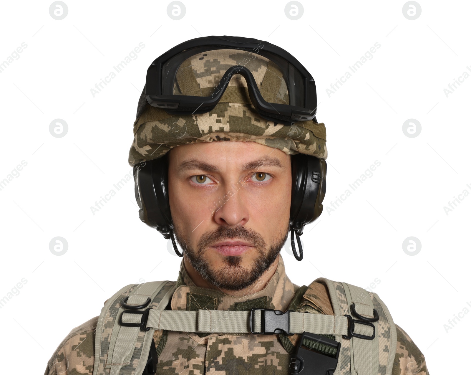 Photo of Soldier in Ukrainian military uniform with tactical goggles and headphones on white background