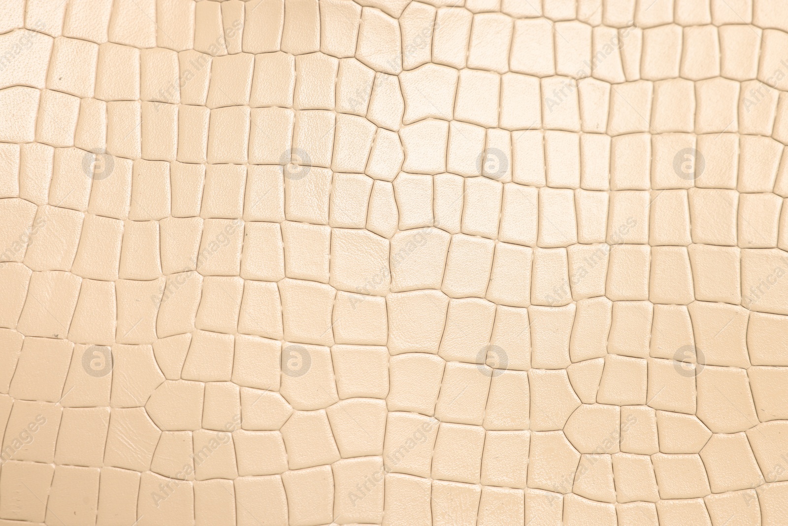 Photo of Beige natural leather as background, top view