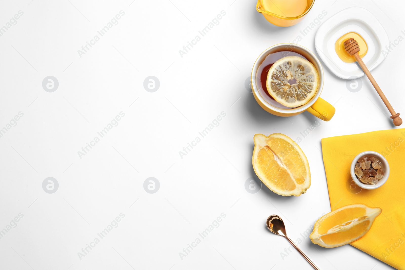 Photo of Composition with lemon tea on white background, top view. Space for text