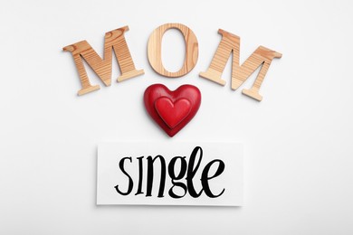 Photo of Words Single Mom and heart on white background, flat lay