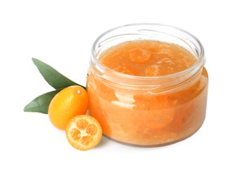 Jar of delicious kumquat jam, fresh fruits and leaves on white background