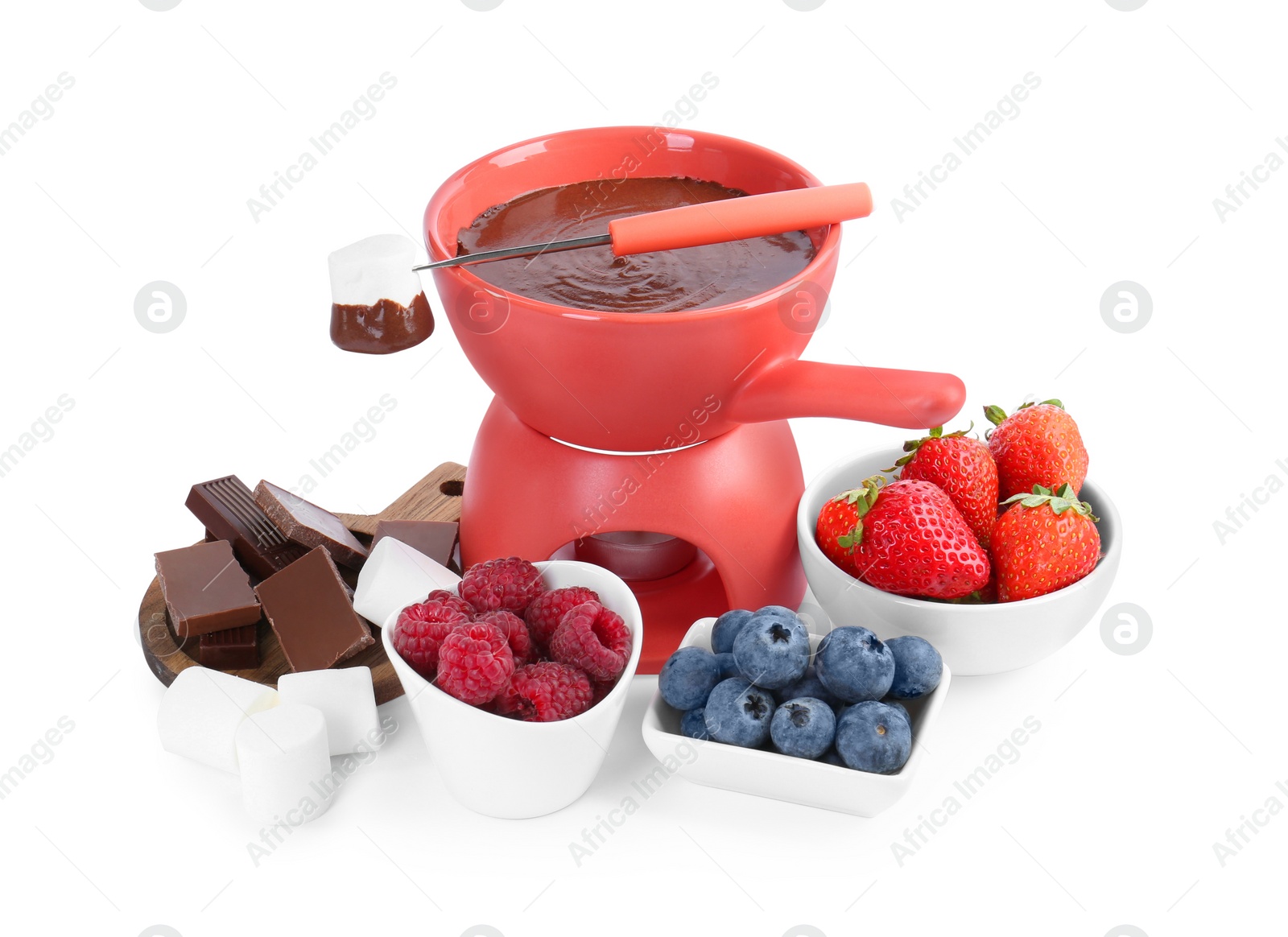 Photo of Fondue pot with melted chocolate, fresh berries, marshmallows and fork isolated on white