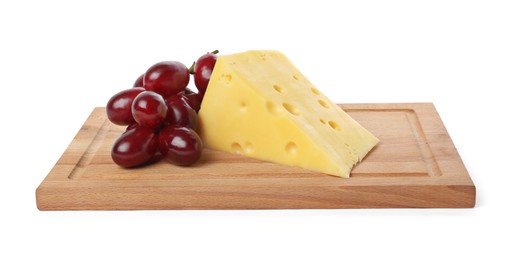 Photo of Piece of delicious cheese and grapes isolated on white