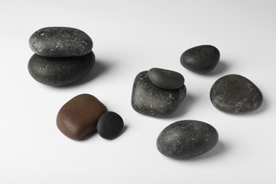 Group of different stones on white background