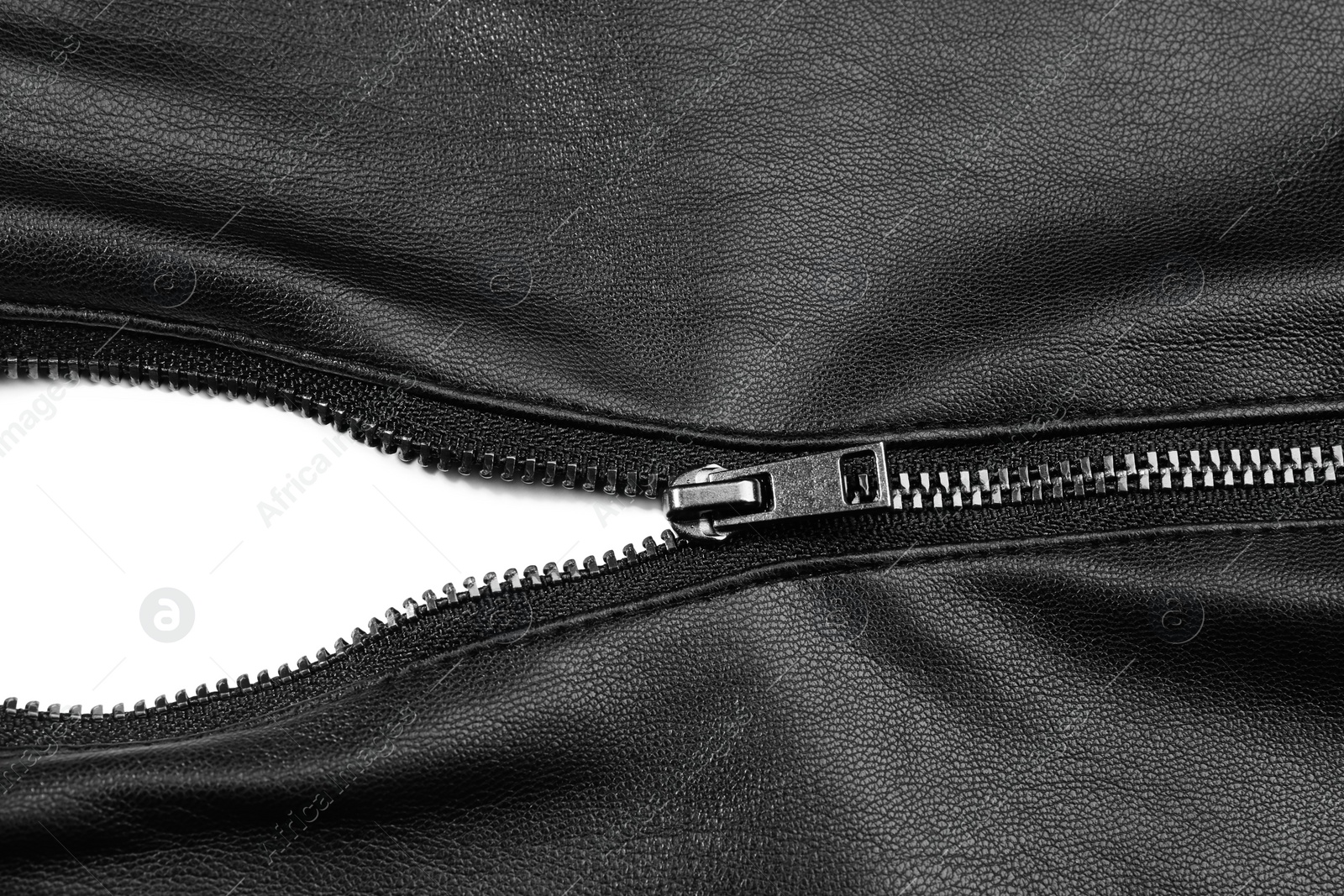 Photo of Black leather jacket with zipper on white background, top view