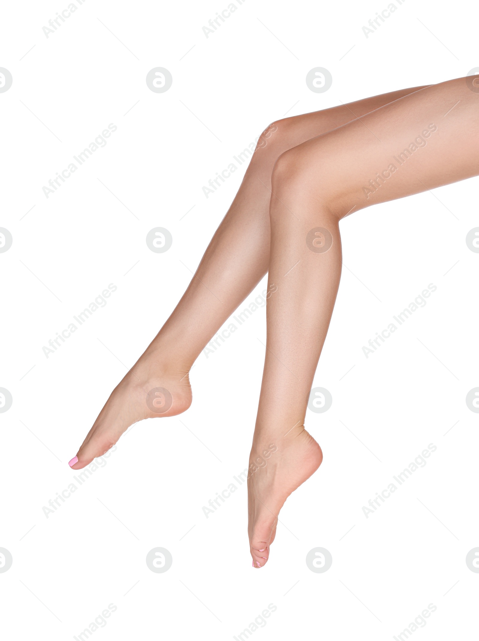 Photo of Woman with beautiful long legs on white background, closeup