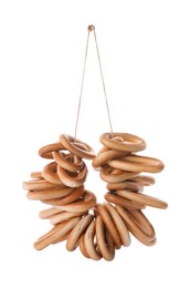 Photo of Bunch of delicious ring shaped Sushki (dry bagels) on white background