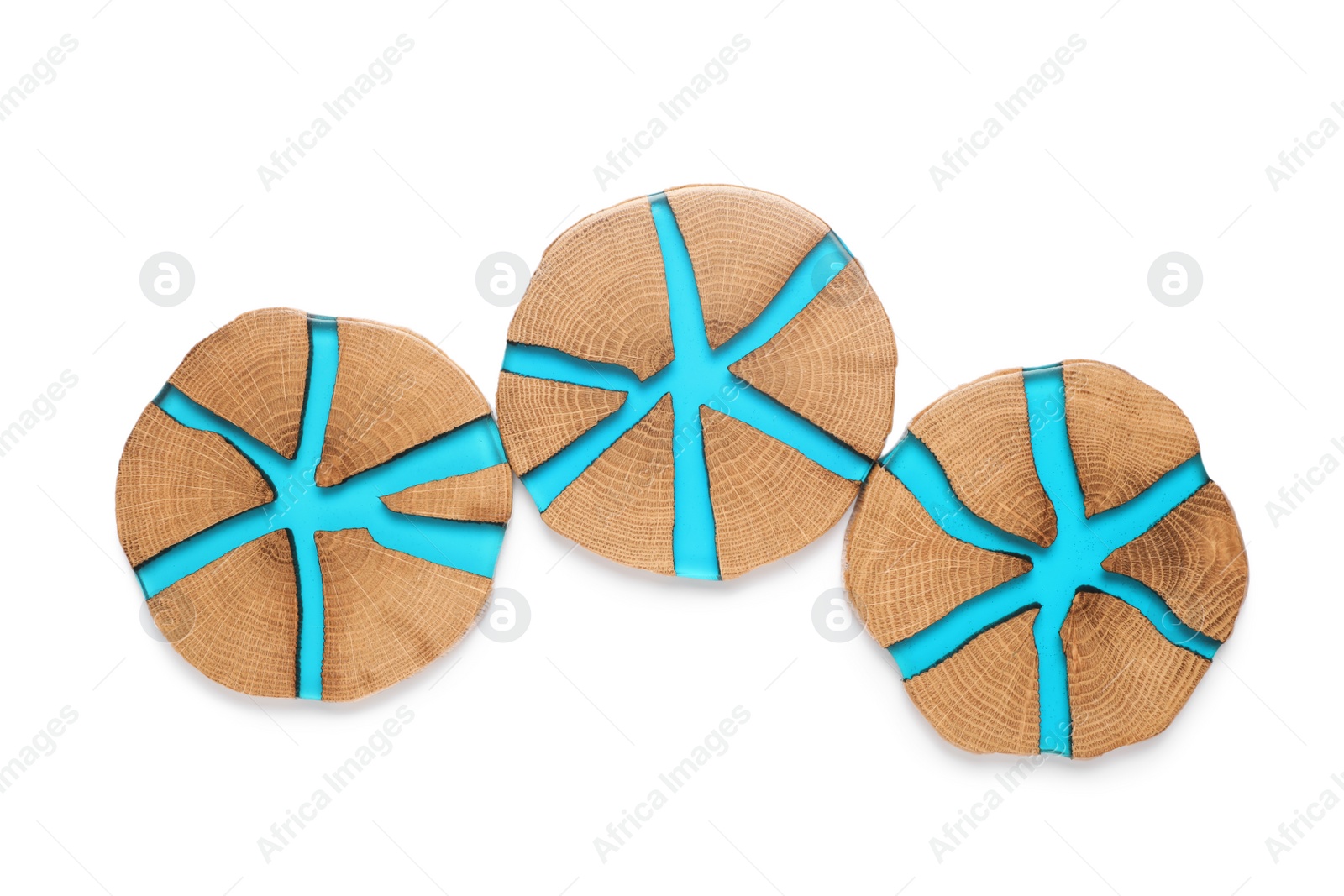 Photo of Stylish wooden cup coasters on white background, top view