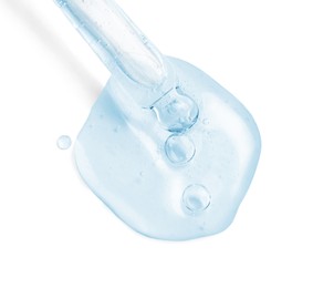 Image of Dropper with serum on white background, top view. Skin care product