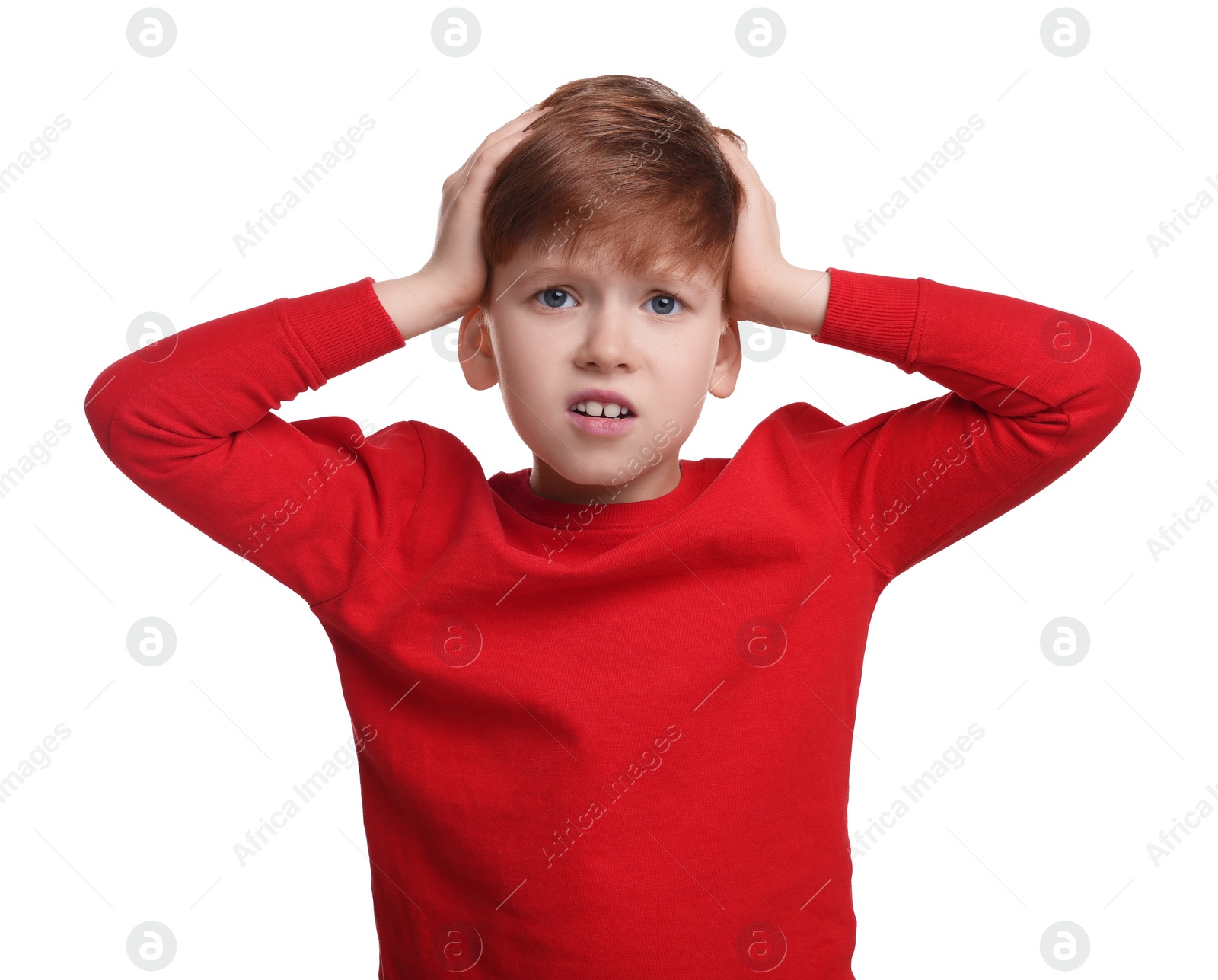 Photo of Portrait of surprised little boy on white background