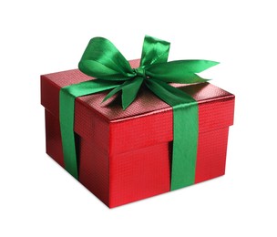 Photo of Christmas gift. Box with green ribbon bow on white background