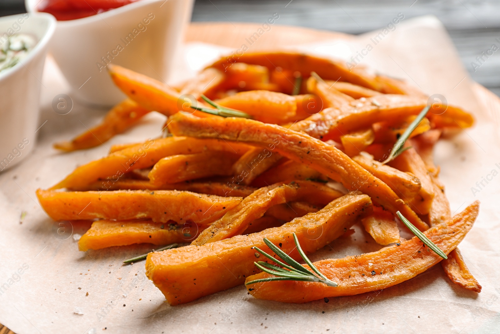 Photo of Closeup view of board with sweet potato fries