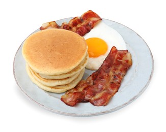 Plate with tasty pancakes, fried egg and bacon isolated on white