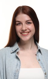 Portrait of smiling woman on white background