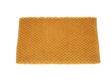 Photo of Soft orange bath mat isolated on white, top view